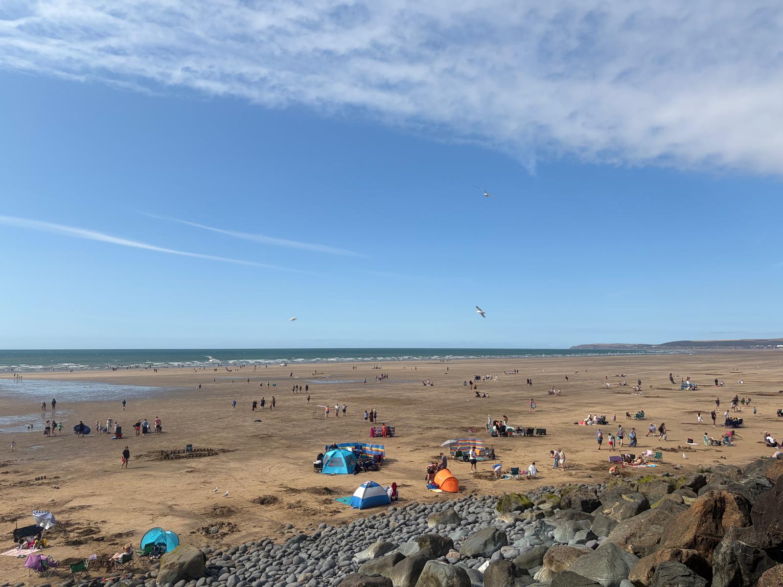 Westward Ho! beach in North Devon, representing the location of Westbeach Holiday Apartments